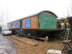 New build survey of steel houseboat at Dell Quay Yacht Yard, Chichester